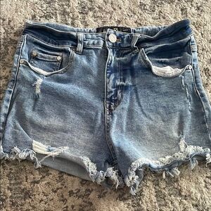 Indigo Rein Blue Jean Shorts with Distressed Cut-Off Style